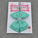Bandeau Élastique Noeud Papillon Accessoires Enfant Bleu Turquoise / Taille Unique - Parents Sereins