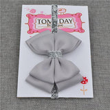 Bandeau Élastique Noeud Papillon Accessoires Enfant Gris / Taille Unique - Parents Sereins
