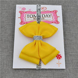 Bandeau Élastique Noeud Papillon Accessoires Enfant Jaune Vif / Taille Unique - Parents Sereins