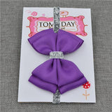 Bandeau Élastique Noeud Papillon Accessoires Enfant Violet Vif / Taille Unique - Parents Sereins